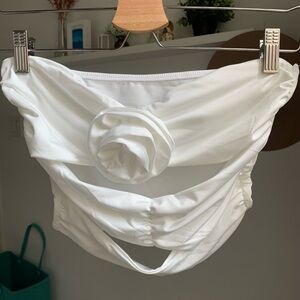 White crop top cut out with a rose in the front